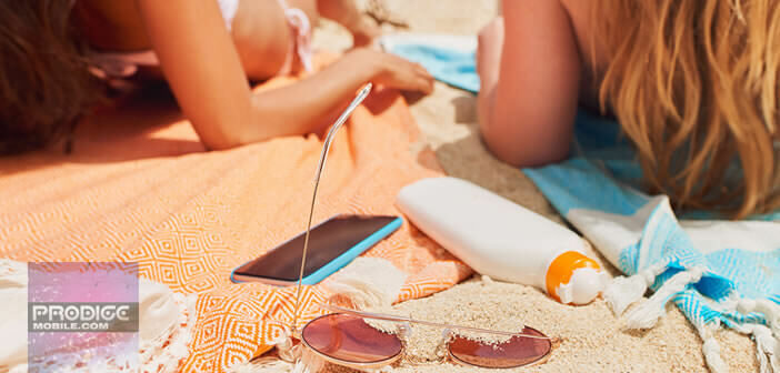 Passez de bonnes vacances avec son smartphone sur la plage