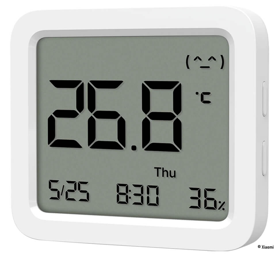 Thermomètre Bluetooth Xiaomi Mi associé à son application mobile pour suivre la température d’une pièce.