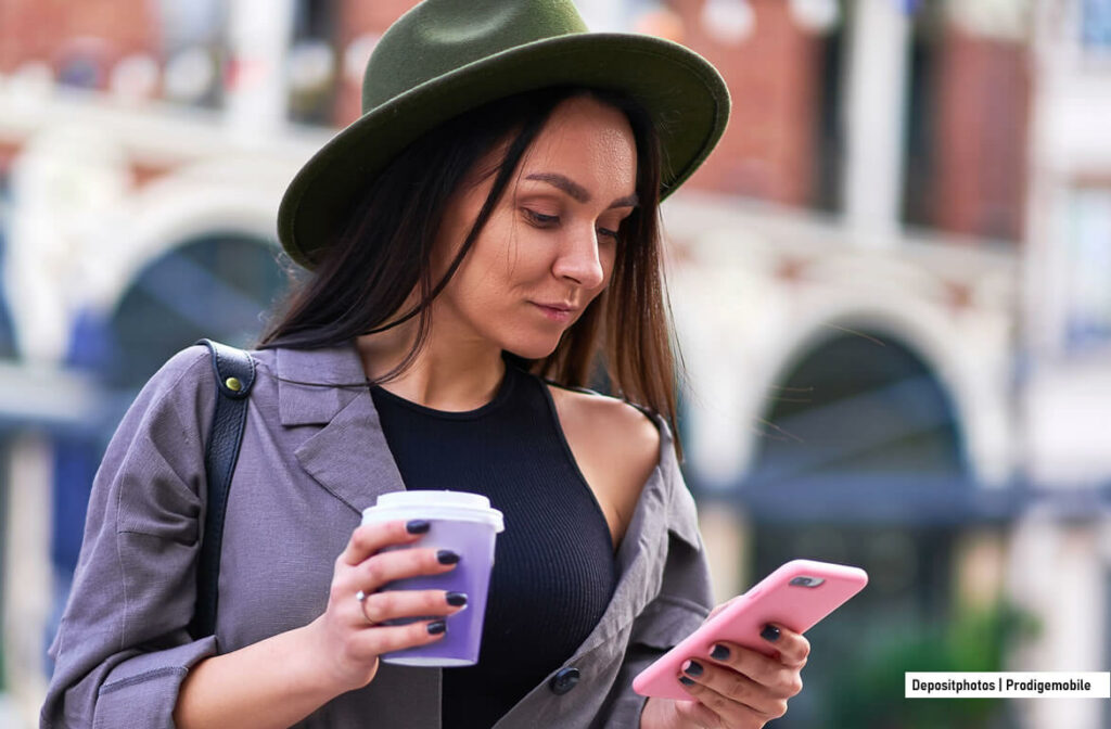 Comment personnaliser le bouton action de son iPhone Femme utilisant le bouton Action de son iPhone
