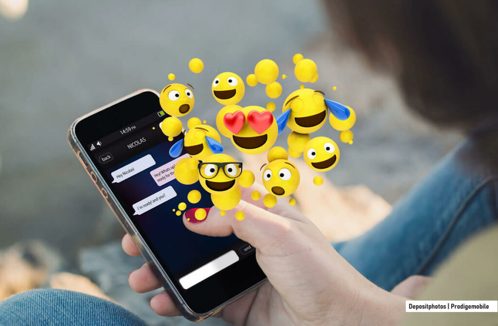 Émojis : ce que ces petits symboles révèlent vraiment de nous Émojis affichés dans une conversation sur smartphone pour illustrer leur rôle dans les messages